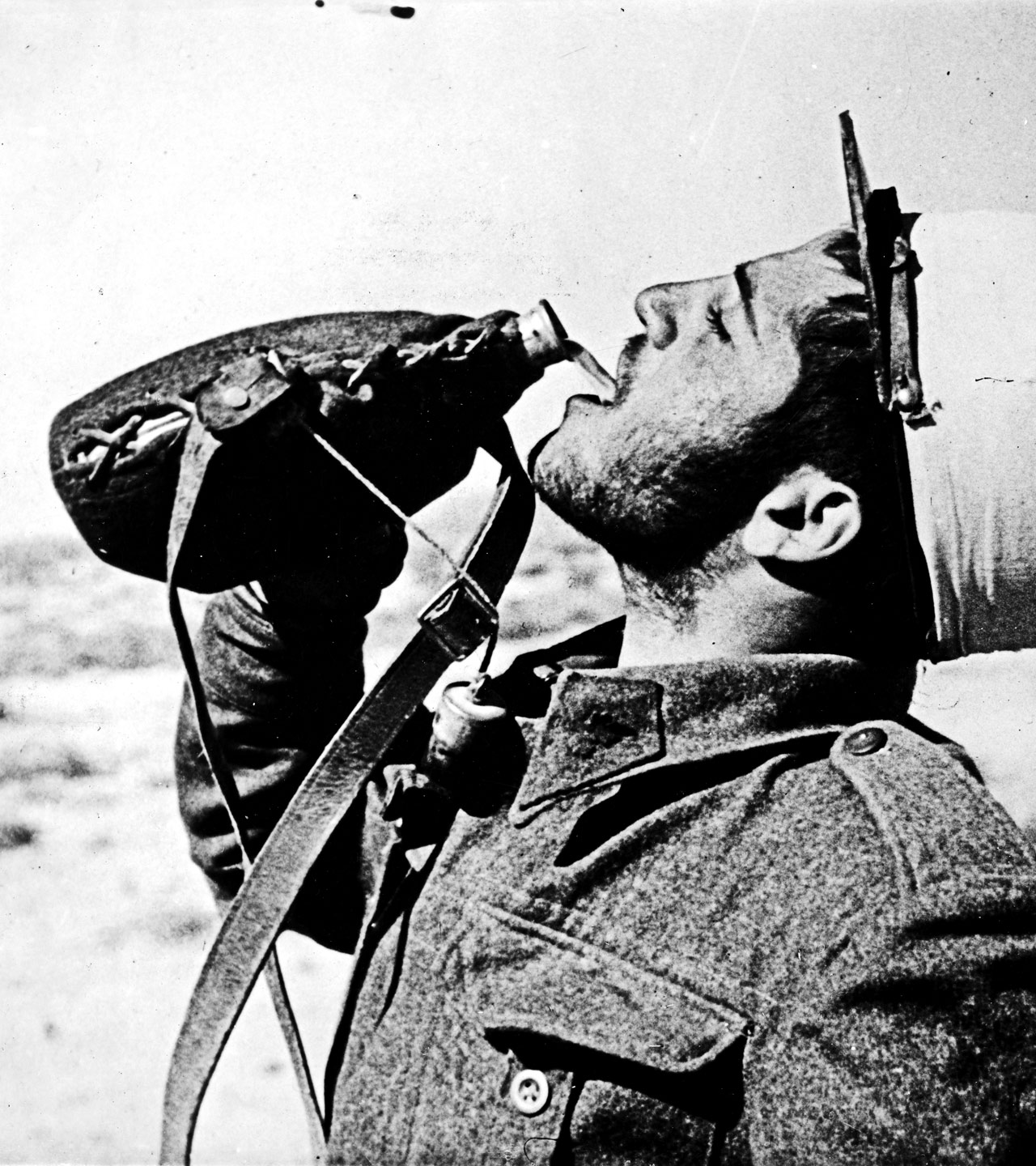 With the free French forces in the Western Desert: A 'poilu' taking a drink after dinner