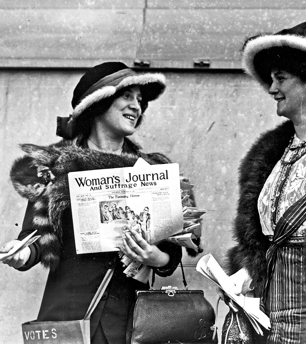 [Suffragist Margaret Foley distributing the Woman's Journal and Suffrage News]
